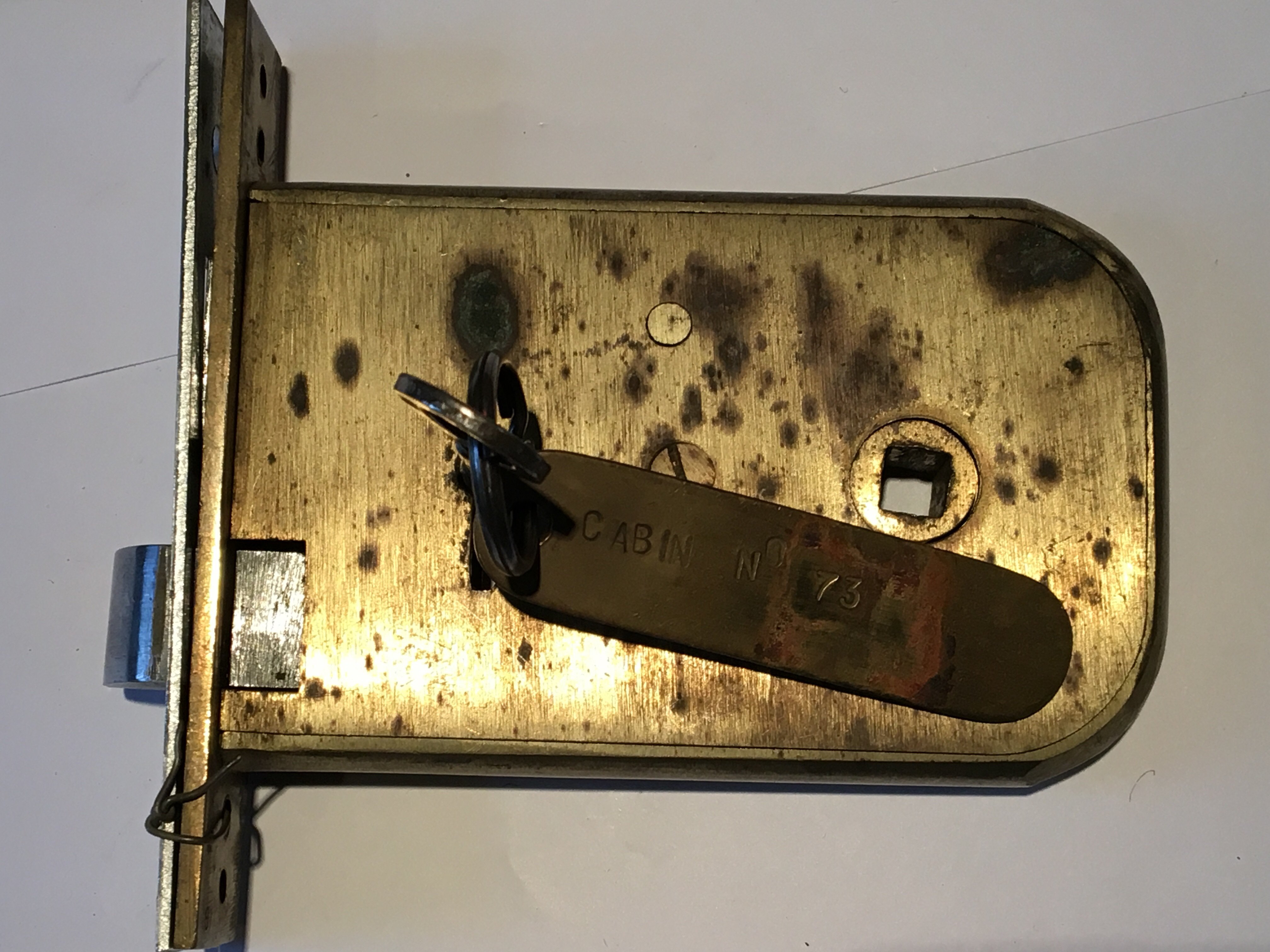 A brass horizontal lock from a vintage cruiser ship with cabin number 73 tag. Maker N.F Ramsay - Image 2 of 2