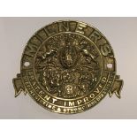A cast brass Millers safe makers plaque. Diameter 17cm