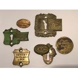 A collection of antique and vintage Safe key escutcheons