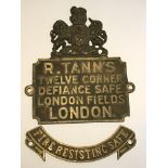 A cast brass lock plate maker R Tanns Twelve corner London.