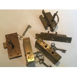 Two Chubb brass cut cabinet locks unused both with original keys stamped by appointment to King