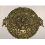 A cast brass Millners safe makers plaque. Diameter 25cm