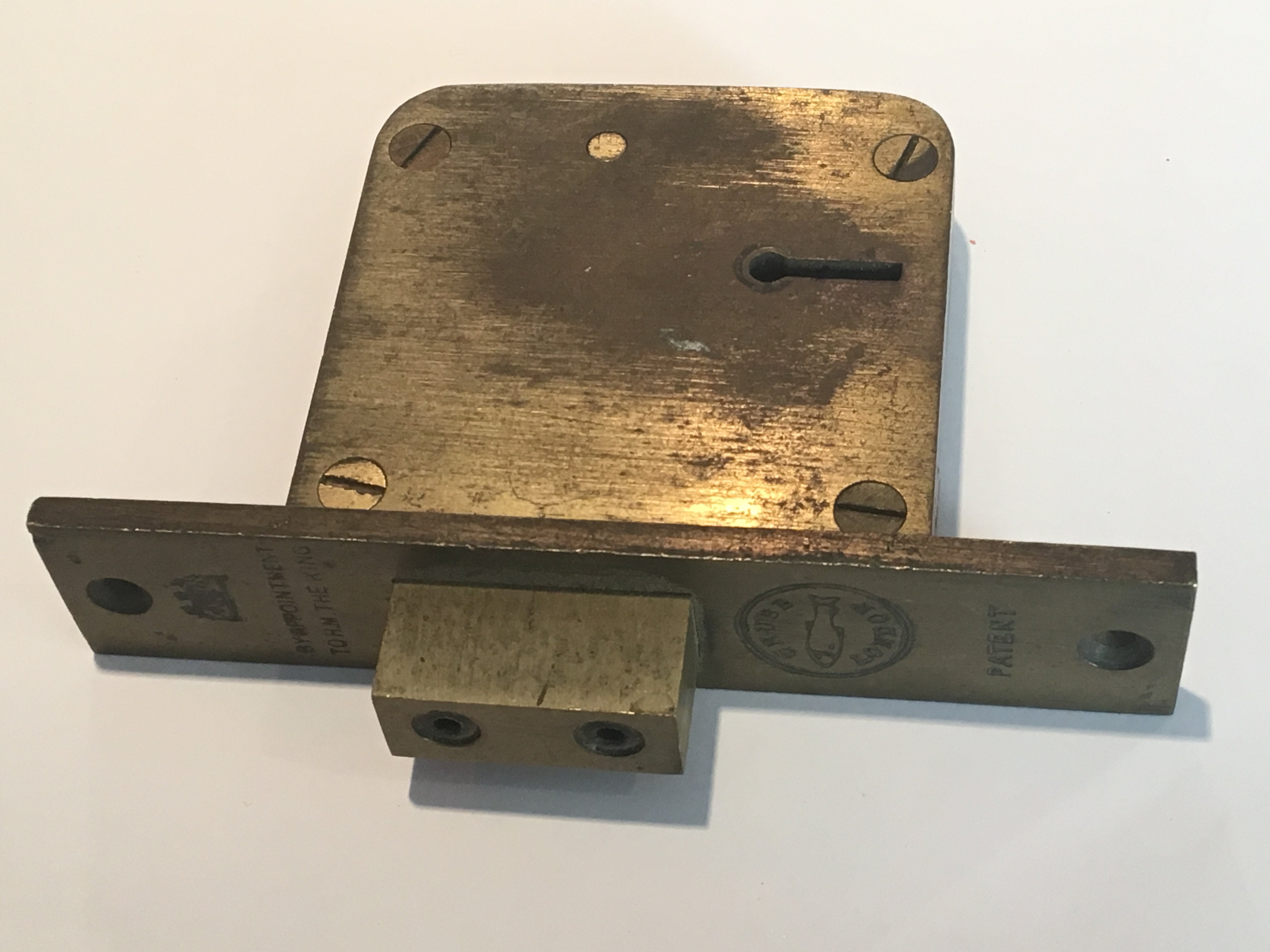 A cast brass Chubb mortice lock stamped and by Royal Appointment to King George V circa 1911 with