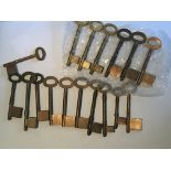 A collection of bronze and brass pin and pipe keys uncut some stamped by maker Chubb.