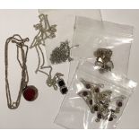 5 silver and stone set pendants and chains plus a