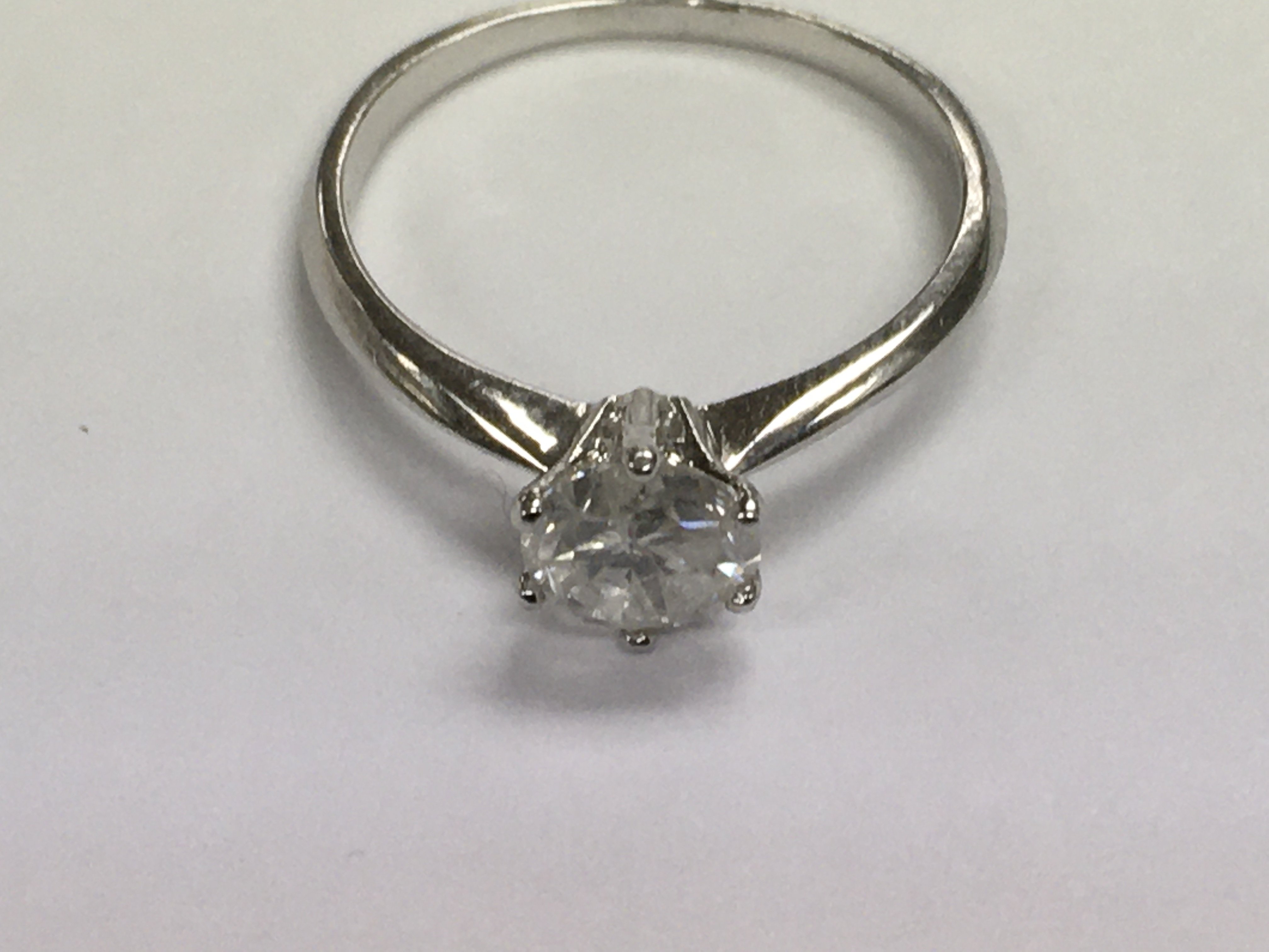 An 18ct white gold diamond solitaire 1.07ct ring, size N.