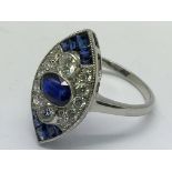 A platinum marquise shaped sapphire and diamond ri