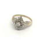 A 9carat gold ring set with a pattern of diamonds. ring size N