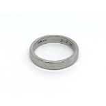 A platinum wedding ring, approx 8.3g