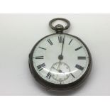 A silver pocket watch with Roman numerals and a su