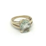 A 9ct gold and aquamarine set ring. (N). 4.2g.