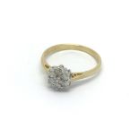 An 18carat gold ring set with a pattern of diamond