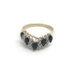 A 9carat gold ring set with sapphires and diamonds