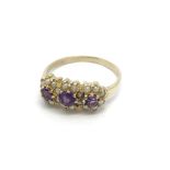 A 9carat gold amethyst and seed pearl ring size Q.