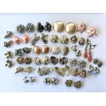 A collection of different earring and ear clips