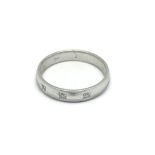 A white 9carat gold ring of modern design set with