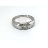 A 9carat white gold Gypsy type ring set with a sol