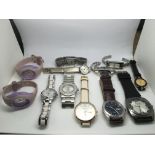 A bag of 12 watches, various makes including Lorus, Rotary, Pulsar and others.