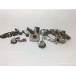 A bag of mixed silver jewellery.