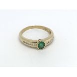 18ct yellow gold emerald and diamond Ring, (P.5),