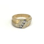 A Gents 14carat gold ring set with three round bri