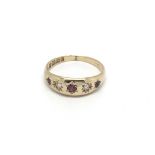 An Edwardian 18ct ruby and diamond ring, (N), 3.3g