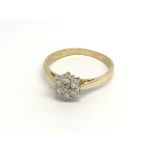 An 18carat Yellow gold ring set with a pattern of