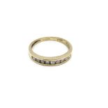 An 18carat gold ring half hoop eternity ring size