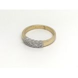 An 18carat gold ring set with five brilliant cut d