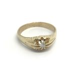 A 9carat gold gypsy type ring ring set with a soli