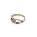 A 9carat gold ring with an open shaped shank set w