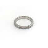 An 18carat white gold half hoop eternity ring set