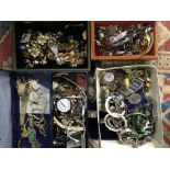 4 boxes of mixed costume jewellery.