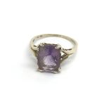A 9carat gold ring set with a large amethyst ring