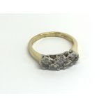 An 18carat Gold ring set with a pattern of brillia