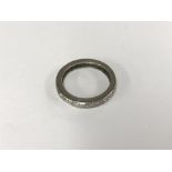 A platinum (tested) and diamond eternity ring (L)2.7g