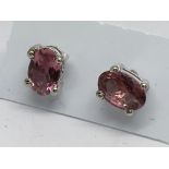 A pair of pink tourmaline studs in silver