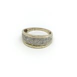 A 9carat gold ring set with rows of diamond ring s