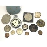 A collection of coins, medals, tokens and watches