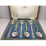 A cased set of six Walker & Hall silver teaspoons,