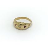 An 18carat gold ruby and diamond ring size M.