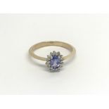 A 9carat gold ring setvwith a Ceylon sapphire and