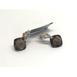 A pair of 9ct gold, diamond and smokey Quartz earr