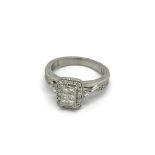 A Palladium diamond set ring with a rectangular pa