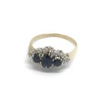 A 9carat gold ring set with three blue sapphire an