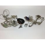 A bag of mixed silver jewellery.