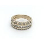 A 14ct yellow gold baguette and marquise cut diamo