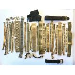 A bag of watch straps including gold plated and me