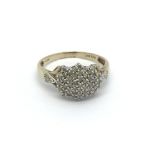 A 9ct gold diamond cluster ring, approx 2.9g and a