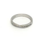 An 18carat white gold ring set with a row of brill